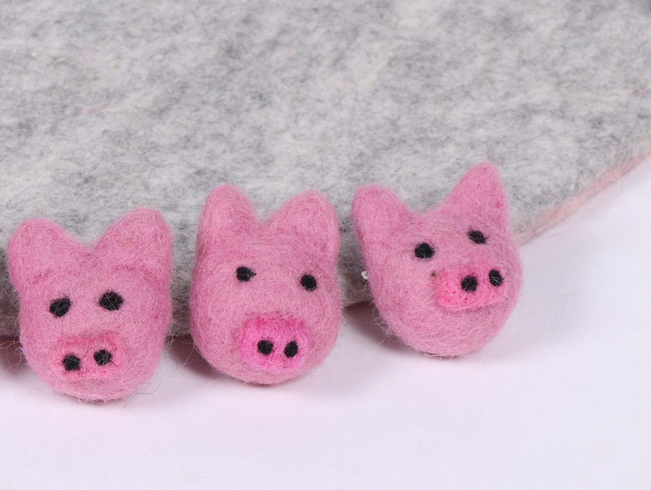 Animal head pink felt brooches