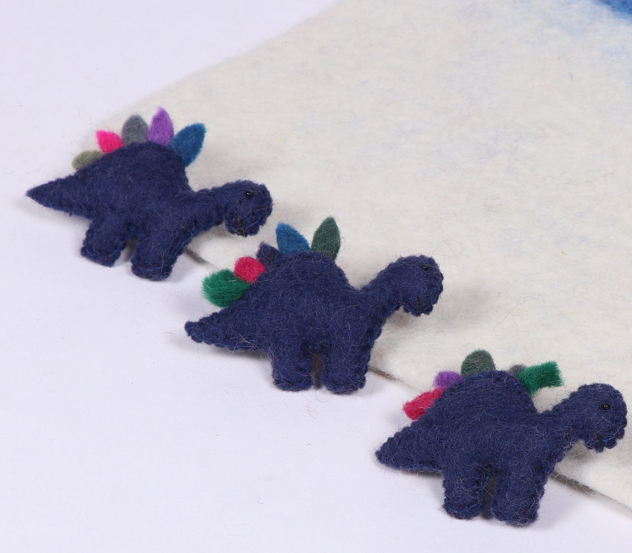 Handmade dinosaur felt brooches